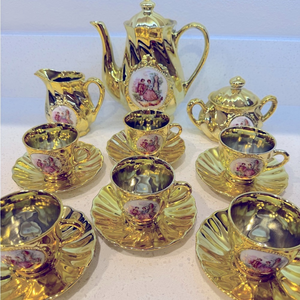 Gold Ceramic Tea Set with Decorative Motifs